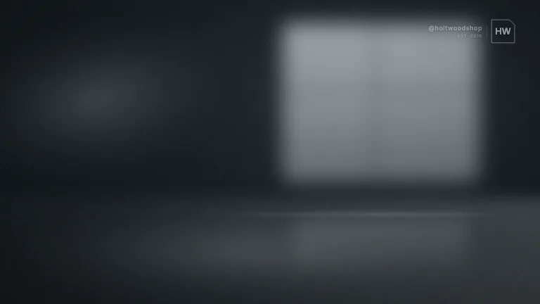 Channel Watermark — A persistent channel bug — a cut-corner monogram and a handle held at low opacity in a frame corner while the shot moves underneath